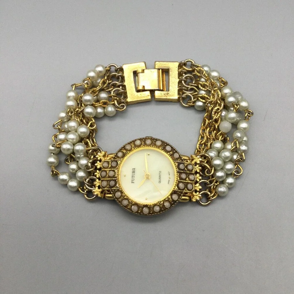 Futura Womens Watch 25mm MOP Dial Gold Tone Faux Pearl 3216 New Battery 6.75